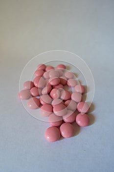 Fistful of pink xylitol candies