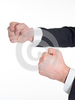 Fists of a businessman. He is ready to fight.