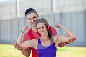 Fit athletic woman with personal trainer