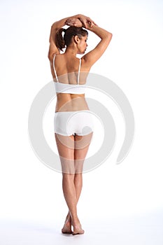 Fit body of young healthy woman in from behind