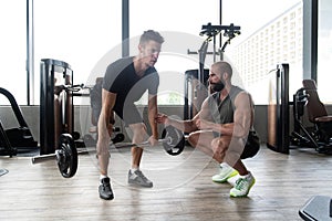 Fit Couple Together Training Back With Weights