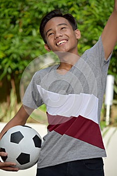 Fit Diverse Male Soccer Player Winner With Soccer Ball