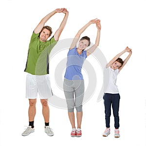 Fit family doing stretching exercise