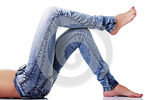 Fit female body in blue jeans