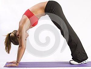 Fit girl doing yoga