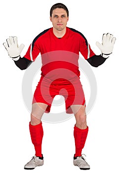 Fit goal keeper looking at camera