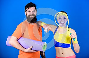 Fit and healthy. Healthy lifestyle concept. Man and woman couple in love with yoga mat and sport equipment. Fitness