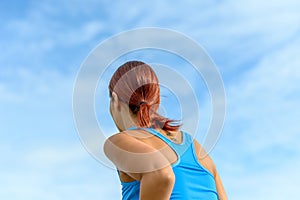 Fit healthy woman enjoying a jog on a summer day