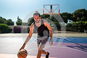 Fit male playing basketball outdoor
