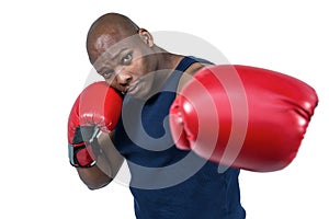 Fit man boxing with gloves