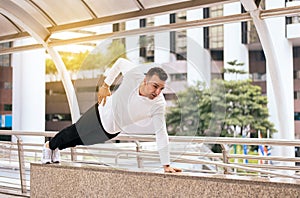 Fit man doing push up strong male with muscular body in the city