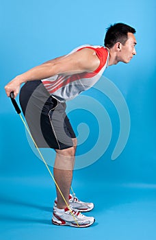 fit man with exercise stretch band