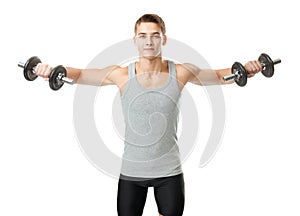 Fit man exercising with dumbbells photo