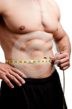 Fit Man Measuring His Waist