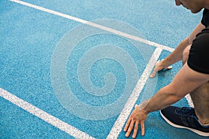 Fit man at the starting line