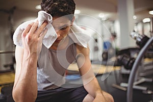 Fit man taking a break from working out