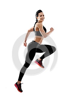 Fit model running on white studio background.