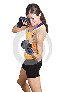 Fit and muscular woman boxing