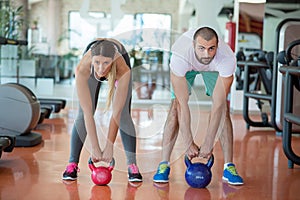 Fit people working out in fitness class at the gym