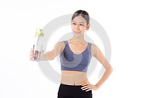 Fit portrait young asian woman smile taking a break from workout holding a clear water bottle.