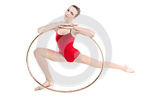 Fit rhythmic gymnast training with hoop