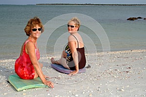 Fit senior women at beach