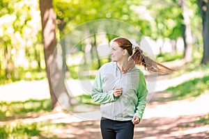 Fit sportive women jogging in the park