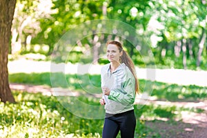 Fit sportive women jogging in the park