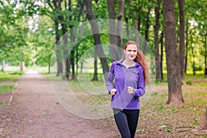 Fit sportive women jogging in the park