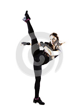 Fit woman doing a high kick