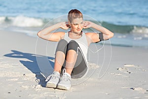 Fit woman doing sit up