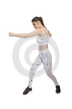 Fit Woman In a Fighting Stance Punching