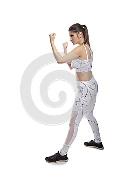 Fit Woman In a Fighting Stance Punching