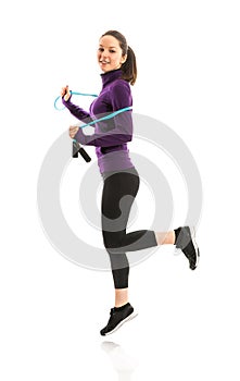 Fit woman with jump rope