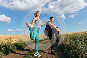 Fit woman motivate her friend at outdoor workout