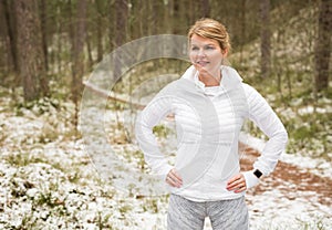 Woman ready for winter workout in forest