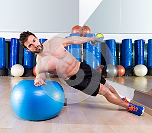 Fitball abdominal side push ups Swiss ball man