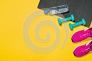 Fitness accessories on yellow background mock up, top view