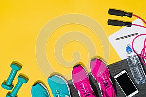 Fitness accessories on yellow background mock up, top view