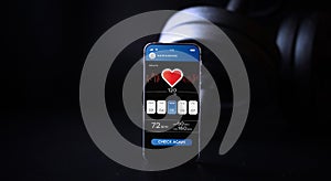 Fitness app. Smart phone screen with fitness health or sport gym mobile application on black dumbbell background. App