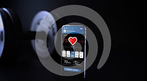Fitness application. Smartphone screen with sport gym or fitness health mobile application on black dumbbell background
