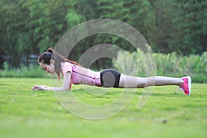 Fitness Asian Chinese woman do plank exercise