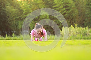 Fitness Asian Chinese woman do plank exercise