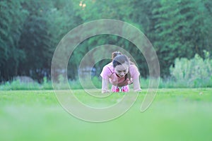 Fitness Asian Chinese woman do plank exercise