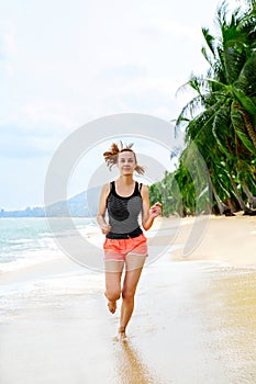 Fitness. Athletic Woman Running On Beach. Sports, Exercising, He