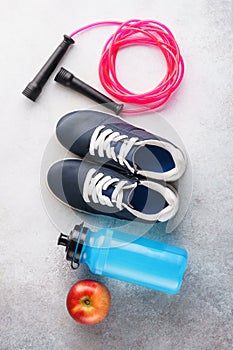 Fitness background with various sport equipment. Flat lay