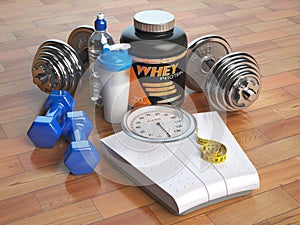 Fitness, bodybuilding or weight loss concept. Weight scales, dumbbells whey protein powder with shaker. Healthy lifestyle.