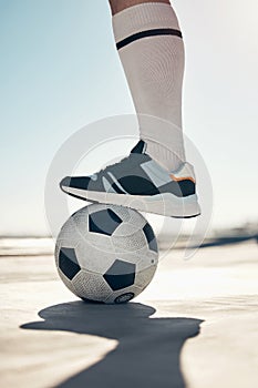 Fitness, city soccer and foot on ball, friendly game in summer heat, man ready to score goals closeup. Football