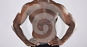 Fitness, closeup and muscular black man, health and wellness with guy on grey studio background. Nigerian male
