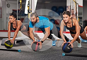 Fitness coach doing workout with girls